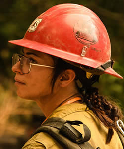a side portrait of a female wildland firefihgter