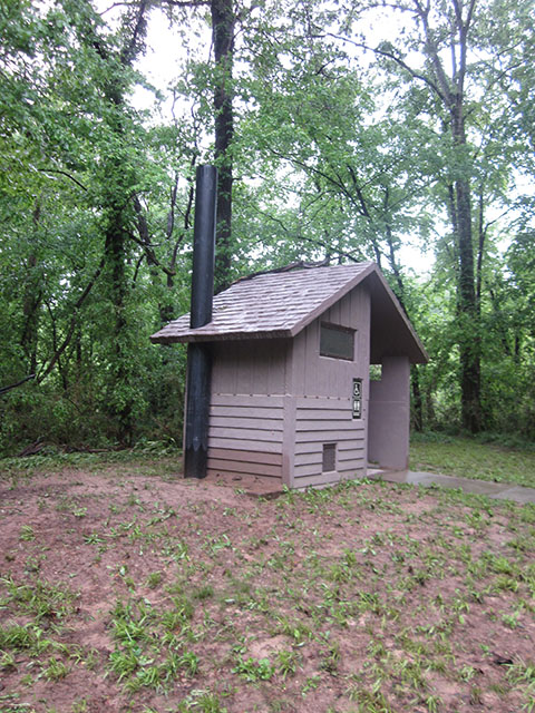 (image) Day use area restroom covered with debris.