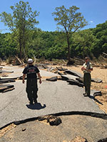 (image) Day use area Roadway broken up.
