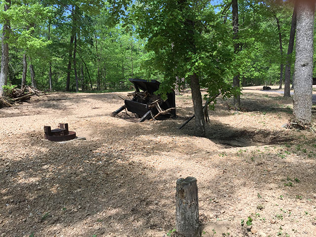 (image) Day use bulliten board uprooted and debris