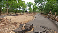 (image) Watercress access road and park area washed out with debris.