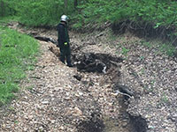 (image) trail washed out about 2 foot deep.