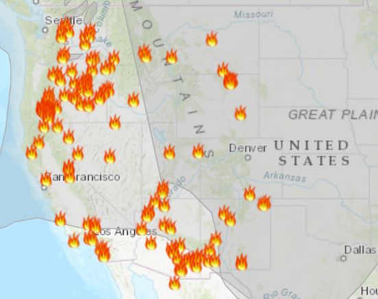 map of US and Canada showing active fire locations and smoke plumes covering the western United States