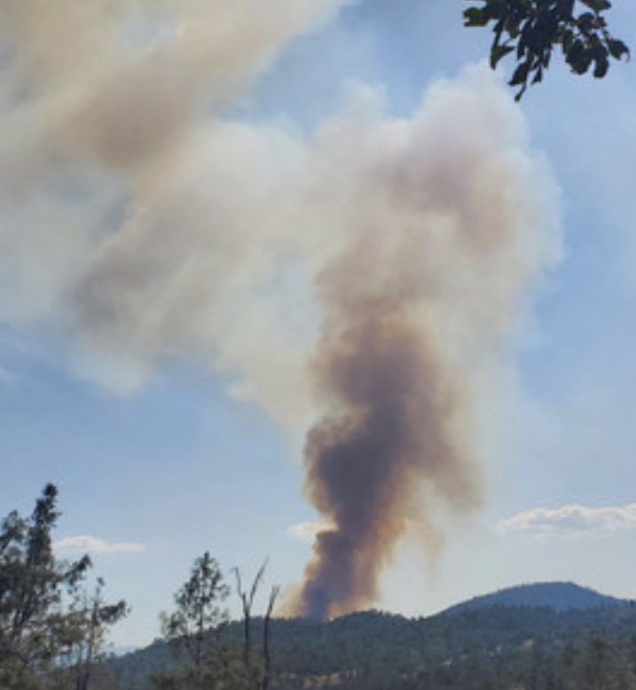 Medium to large column of black smoke